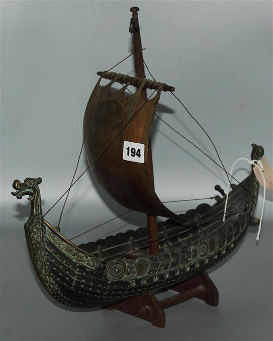 Bronzed model of a Viking longboat, on wooden stand